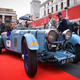 The red carpet of the Mille Miglia “Village” is a madhouse parade in the hours leading up to the start of the race.